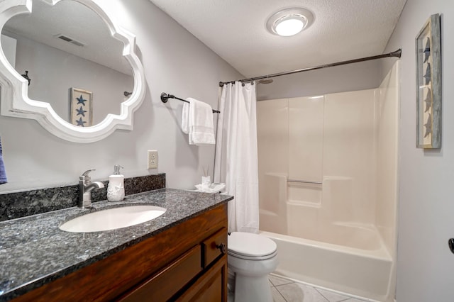 full bathroom with shower / tub combo, vanity, a textured ceiling, tile patterned flooring, and toilet