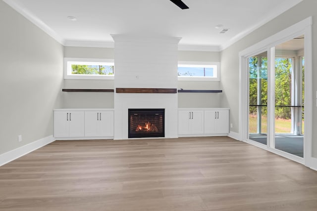 202 Countryside Way, Summerville, SC 29483 - unfurnished living room with crown molding, baseboards, plenty of natural light, and light wood finished floors