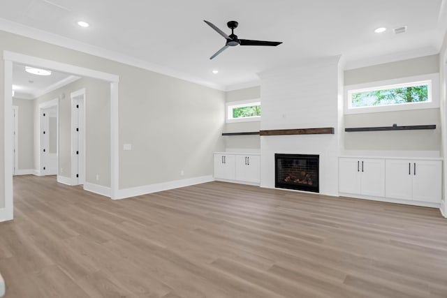 202 Countryside Way, Summerville, SC 29483 - unfurnished living room with crown molding, ceiling fan, baseboards, and light wood-type flooring