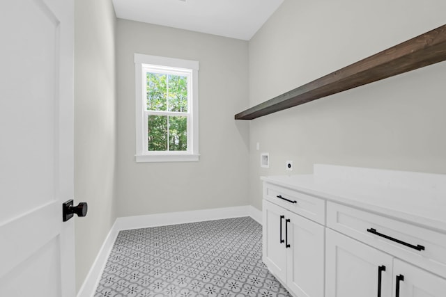 202 Countryside Way, Summerville, SC 29483 - laundry area with cabinet space, electric dryer hookup, baseboards, and hookup for a washing machine