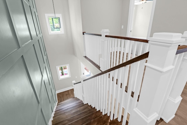 202 Countryside Way, Summerville, SC 29483 - staircase featuring baseboards, a towering ceiling, and wood finished floors