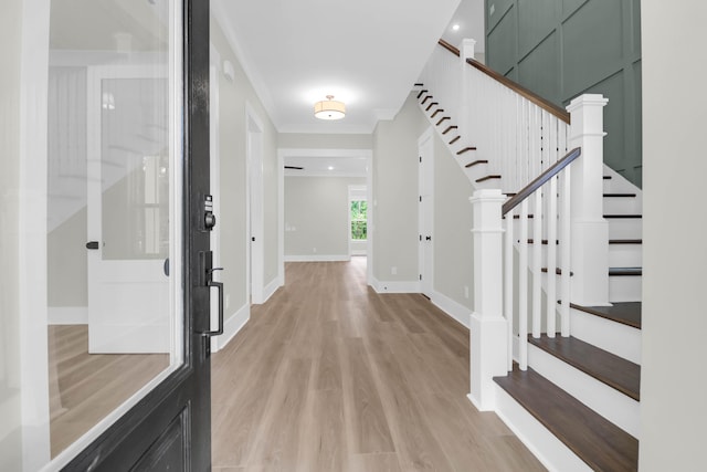 202 Countryside Way, Summerville, SC 29483 - entrance foyer featuring crown molding, baseboards, light wood finished floors, and stairs
