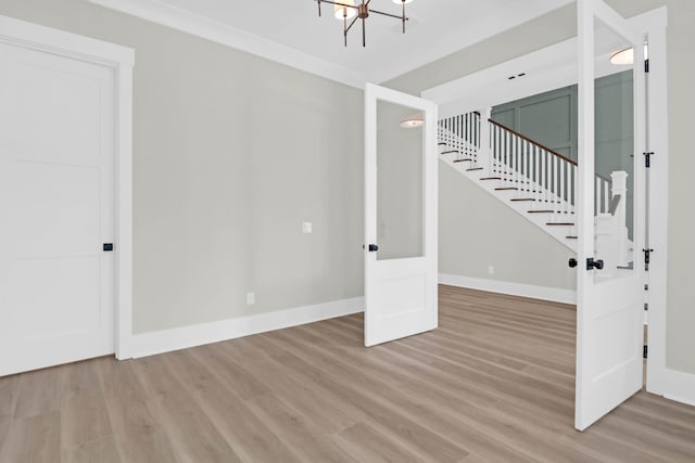 202 Countryside Way, Summerville, SC 29483 - unfurnished living room featuring stairway, baseboards, light wood finished floors, and a chandelier