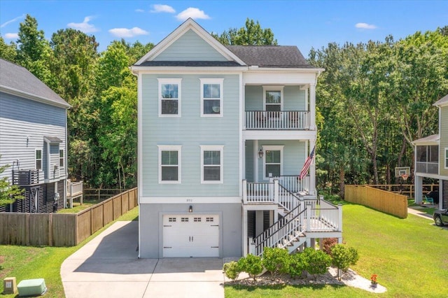 3751 Copahee Sound Dr, Mount Pleasant, SC 29466 - beach home with concrete driveway, stairway, an attached garage, a porch, and a balcony