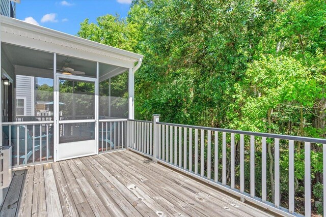 3751 Copahee Sound Dr, Mount Pleasant, SC 29466 - wooden deck featuring a sunroom and a ceiling fan
