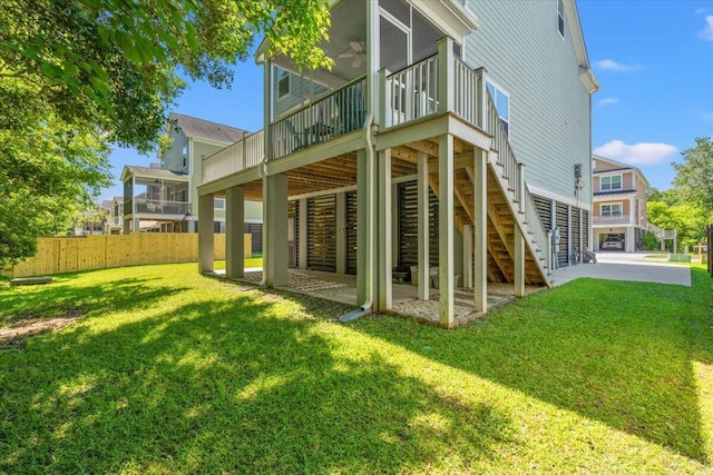 3751 Copahee Sound Dr, Mount Pleasant, SC 29466 - back of house featuring stairway, a sunroom, and a patio area