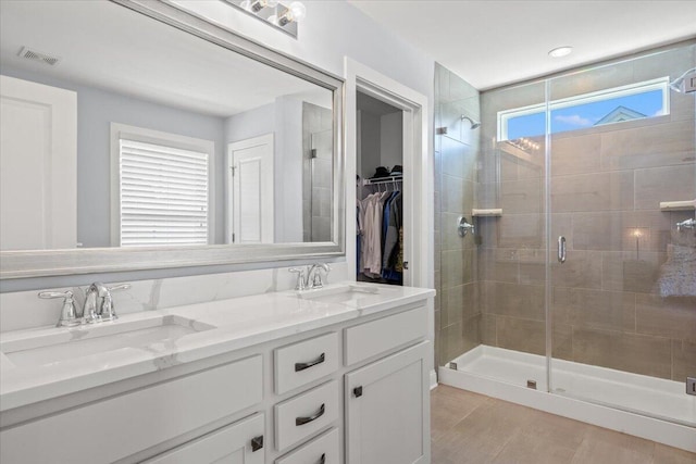 3751 Copahee Sound Dr, Mount Pleasant, SC 29466 - bathroom with a shower stall, double vanity, and a spacious closet