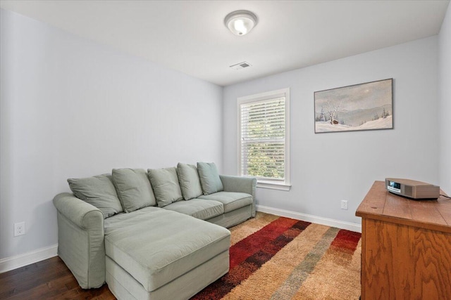 3751 Copahee Sound Dr, Mount Pleasant, SC 29466 - living room featuring baseboards and wood finished floors
