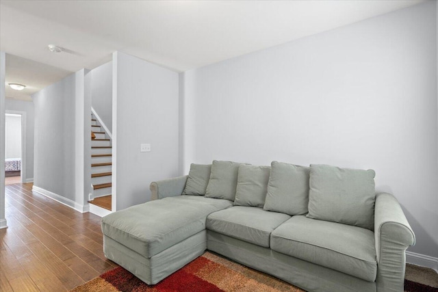 3751 Copahee Sound Dr, Mount Pleasant, SC 29466 - living area with dark wood-type flooring, stairway, and baseboards