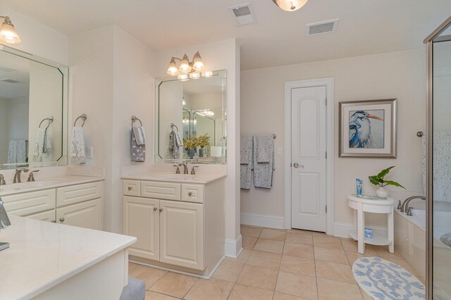 265 Venice Way Unit 1-201, Myrtle Beach, SC 29577 - bathroom featuring vanity, shower with separate bathtub, and tile patterned flooring