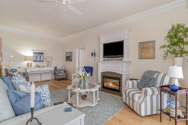265 Venice Way Unit 1-201, Myrtle Beach, SC 29577 - living room featuring crown molding, ceiling fan, and light hardwood / wood-style flooring