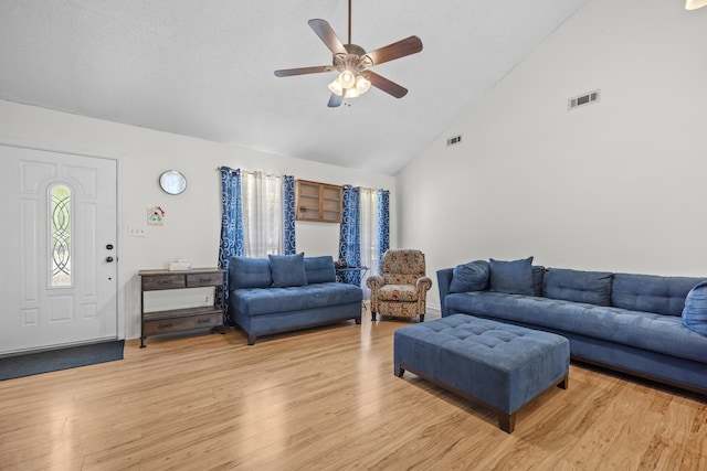 171 N Main St, Ridgeville, SC 29472 - living room with high vaulted ceiling, a ceiling fan, and light wood-style floors