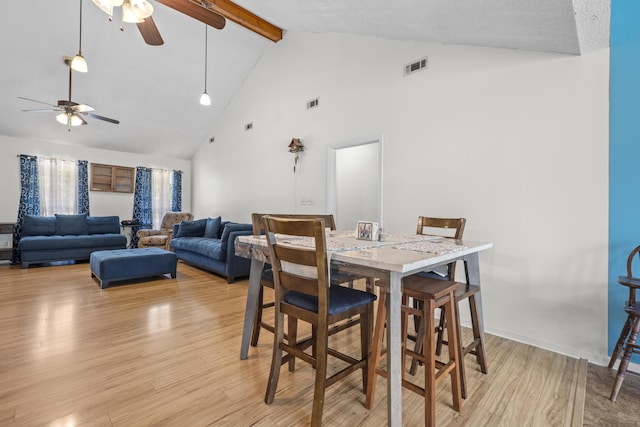 171 N Main St, Ridgeville, SC 29472 - dining area featuring a ceiling fan, high vaulted ceiling, beamed ceiling, and light wood-style floors