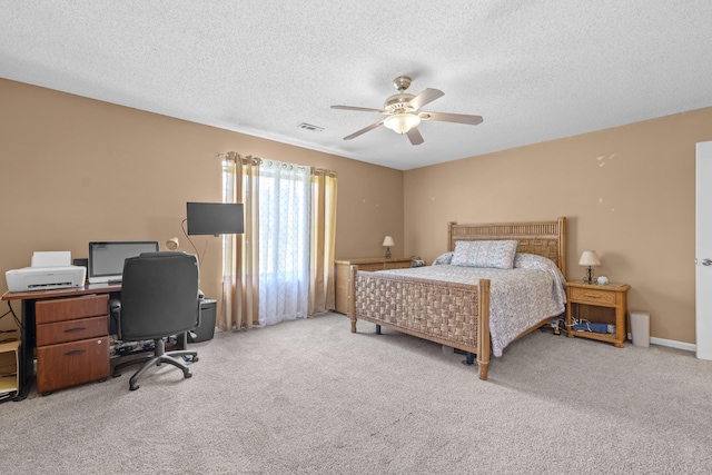 171 N Main St, Ridgeville, SC 29472 - bedroom featuring a desk, a textured ceiling, carpet, and a ceiling fan