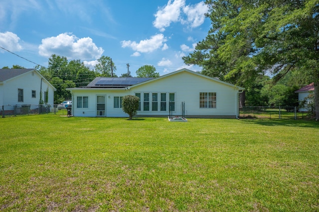 171 N Main St, Ridgeville, SC 29472 - rear view of property with roof mounted solar panels