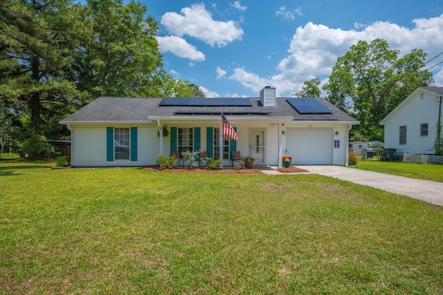 171 N Main St, Ridgeville, SC 29472 - ranch-style house with covered porch, driveway, a garage, and solar panels