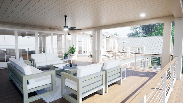 deck with an outdoor living space and a ceiling fan