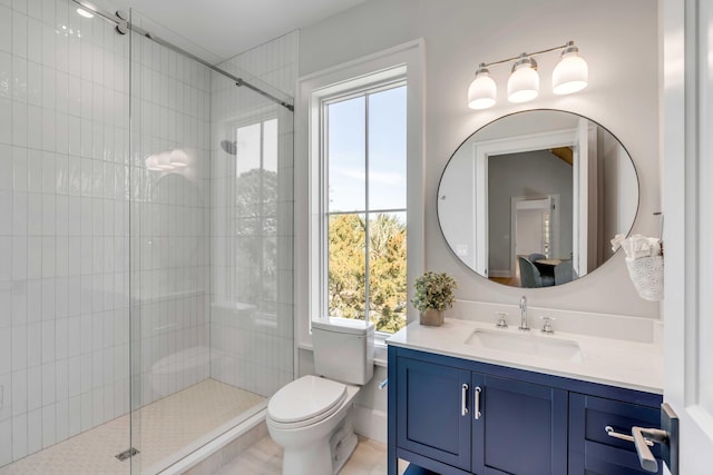 full bath with toilet, a shower stall, and vanity