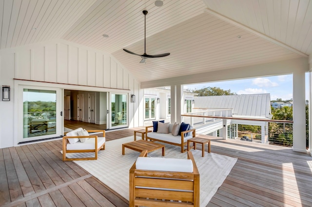 deck featuring outdoor lounge area and ceiling fan