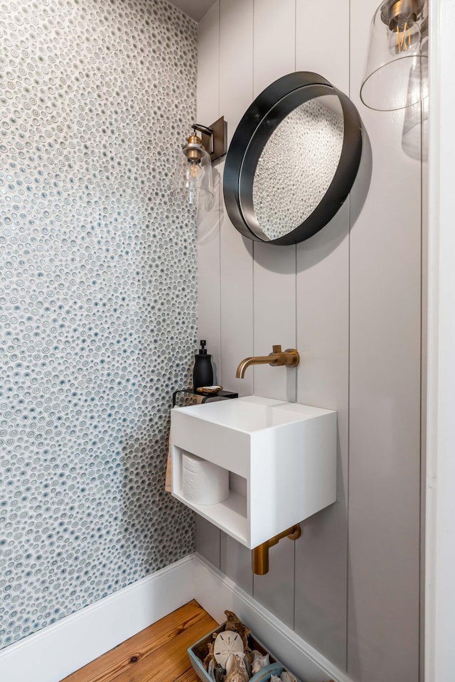 bathroom featuring hardwood / wood-style flooring and sink