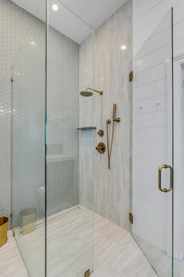 bathroom featuring an enclosed shower