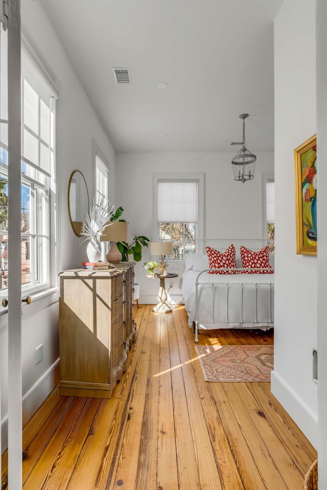 bedroom featuring light hardwood / wood-style floors