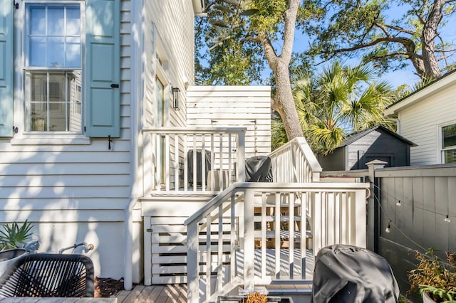 wooden deck with area for grilling