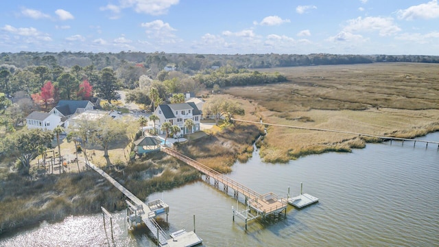 drone / aerial view with a water view