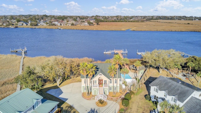 birds eye view of property featuring a water view