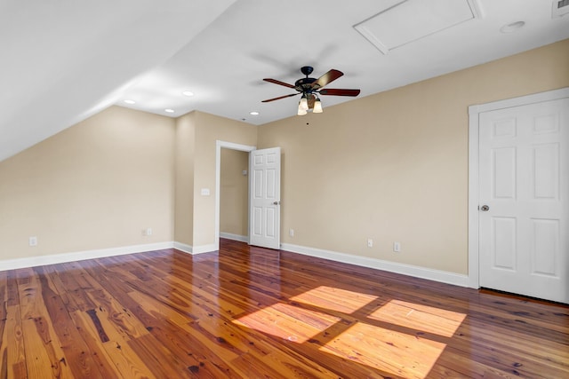 interior space with recessed lighting, attic access, baseboards, and wood-type flooring