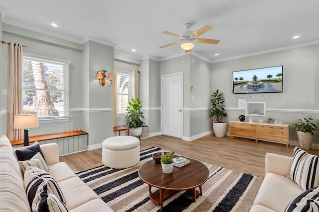 living area featuring recessed lighting, baseboards, light wood-style floors, and ornamental molding