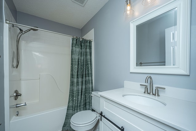 full bathroom with shower / bath combination with curtain, toilet, a textured ceiling, and vanity