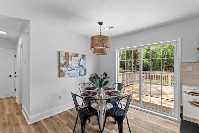 411 Berkeley Dr, Moncks Corner, SC 29461 - dining space with light wood-style floors and baseboards