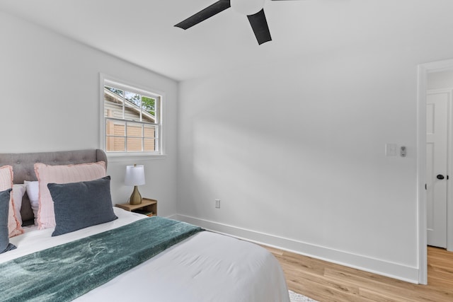411 Berkeley Dr, Moncks Corner, SC 29461 - bedroom with light wood-style flooring, baseboards, and a ceiling fan