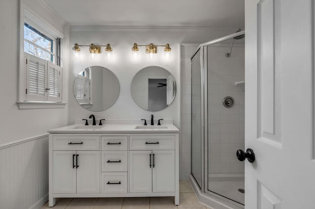 bathroom with vanity, tile patterned flooring, and walk in shower