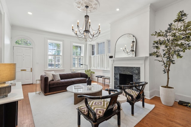 71 E Bay St, Charleston, SC 29401 - living area with a chandelier, ornamental molding, wood finished floors, a premium fireplace, and recessed lighting