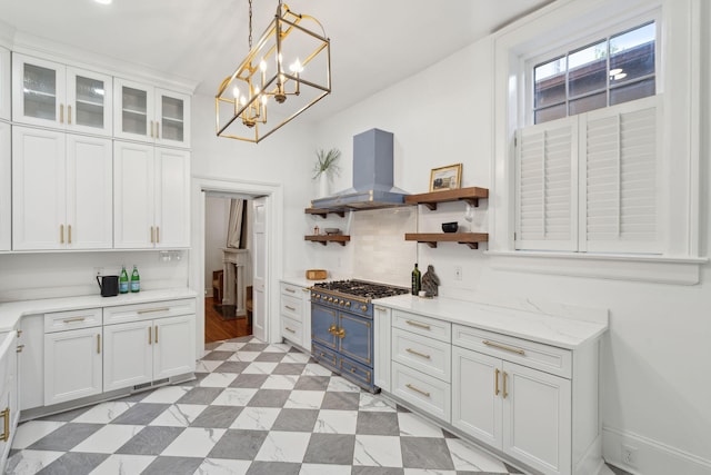 71 E Bay St, Charleston, SC 29401 - kitchen featuring range with two ovens, wall chimney range hood, white cabinetry, open shelves, and pendant lighting