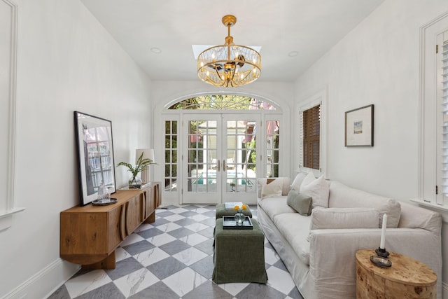 71 E Bay St, Charleston, SC 29401 - living room featuring french doors and a chandelier