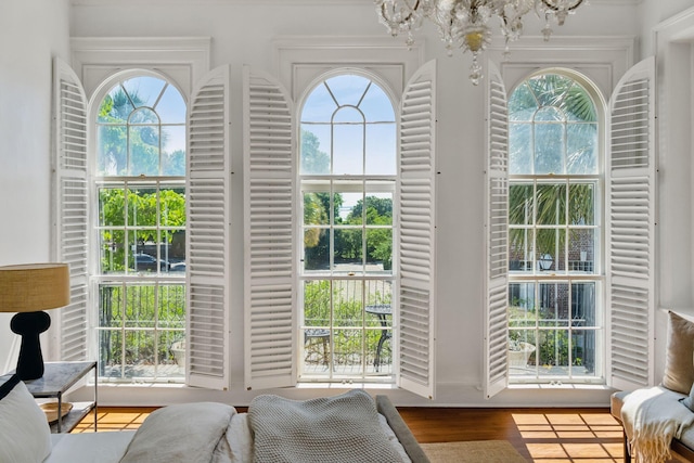 71 E Bay St, Charleston, SC 29401 - doorway to outside with a chandelier and wood finished floors