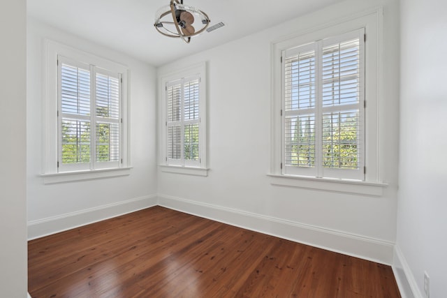 71 E Bay St, Charleston, SC 29401 - unfurnished dining area featuring dark wood-type flooring and baseboards