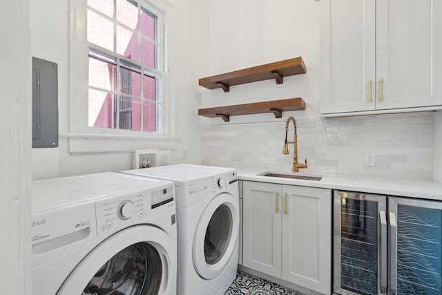 71 E Bay St, Charleston, SC 29401 - washroom featuring wine cooler, separate washer and dryer, cabinet space, bar area, and electric panel