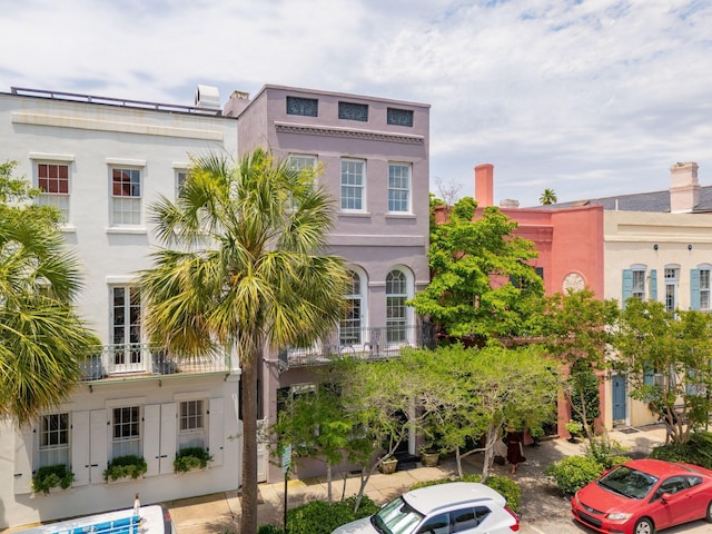 71 E Bay St, Charleston, SC 29401 - view of front of house featuring stucco siding