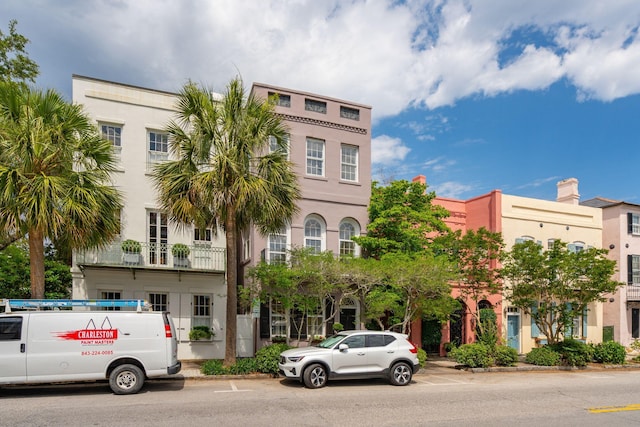 71 E Bay St, Charleston, SC 29401 - townhome / multi-family property featuring stucco siding