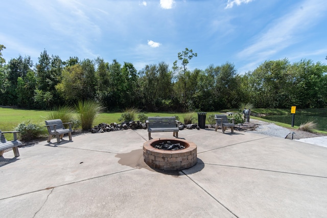 view of patio featuring an outdoor fire pit