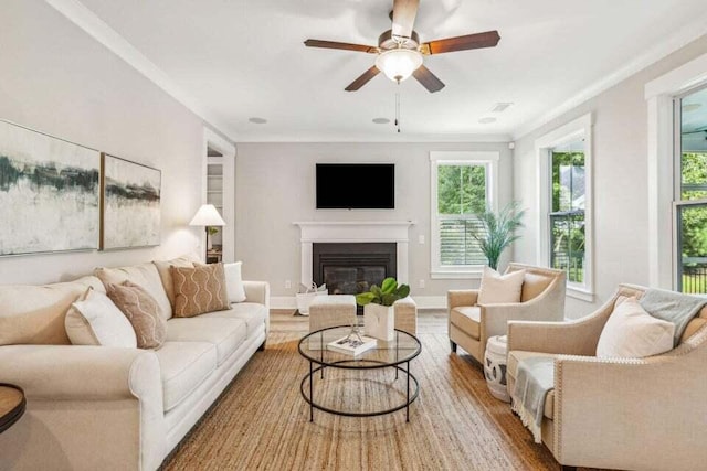 living room featuring hardwood / wood-style flooring and ceiling fan