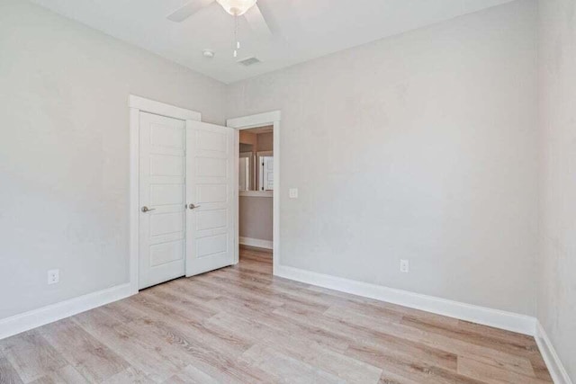 unfurnished bedroom with light hardwood / wood-style floors and ceiling fan