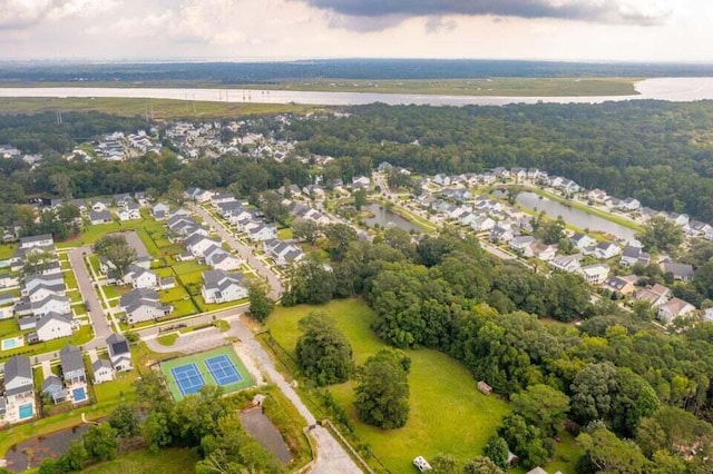 bird's eye view with a water view