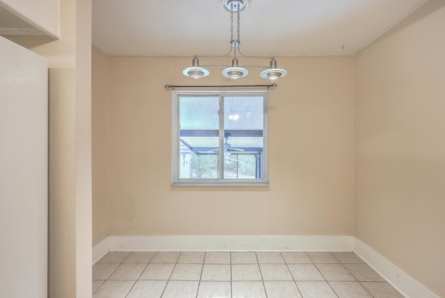 spare room with light tile patterned floors