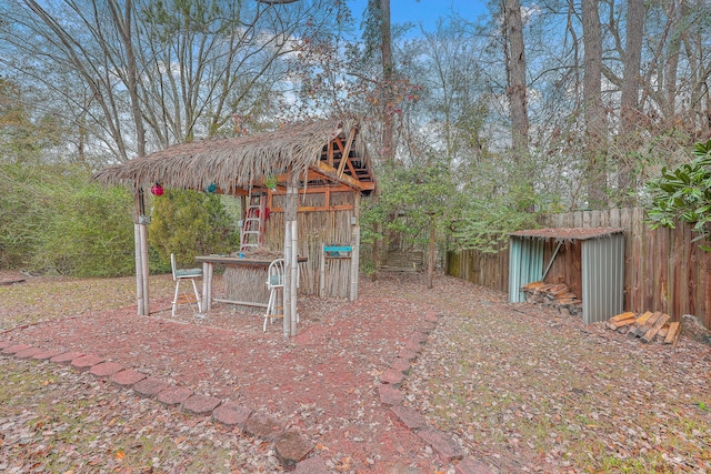 view of patio / terrace with an outbuilding