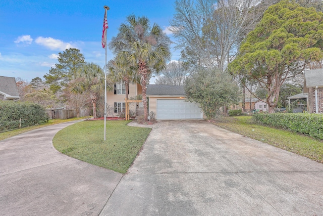 view of front facade featuring a front lawn and a garage